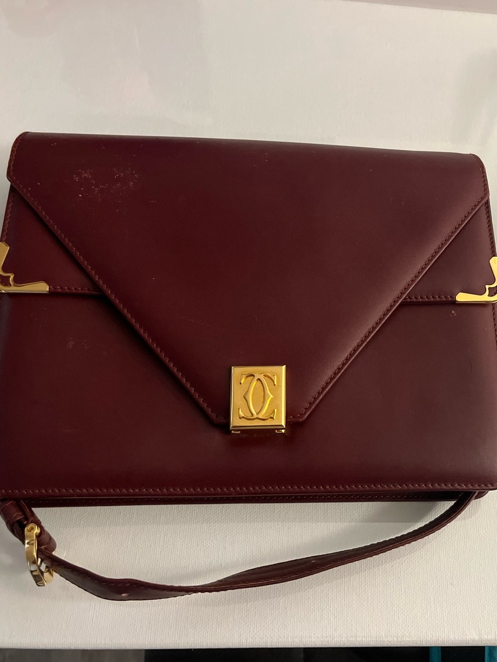 Cartier Burgundy Leather Shoulder Bag with Gold tone Hardware. Authentic!